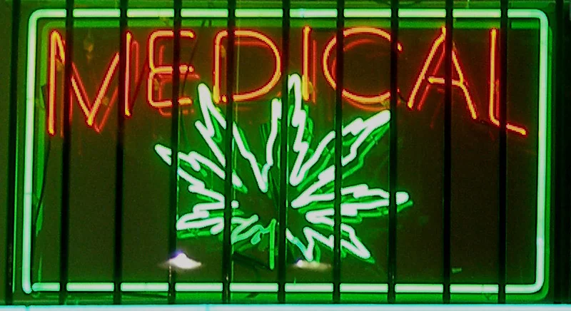 Medical-marijuana dispensary sign in Los Angeles; illustrative medical-cannabis context.