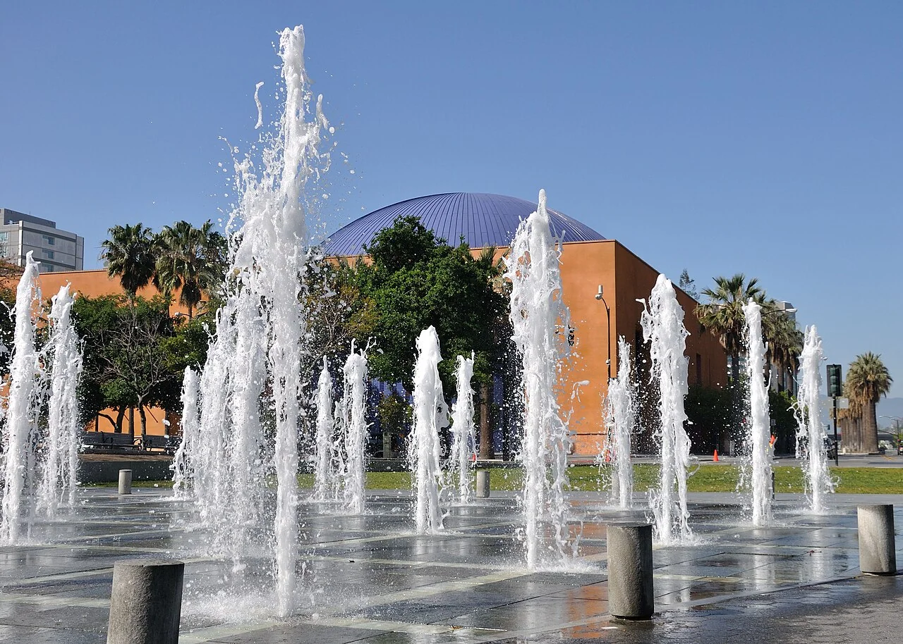Plaza de César Chávez fountain with The Tech Museum behind it; archival San Jose photograph.