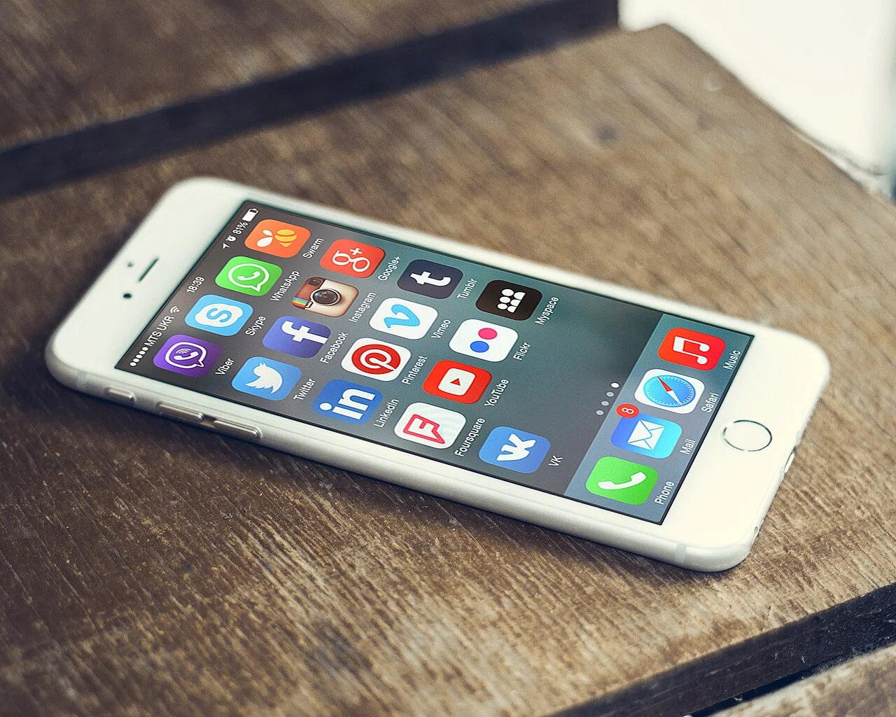 Smartphone screen displaying colorful social media application icons