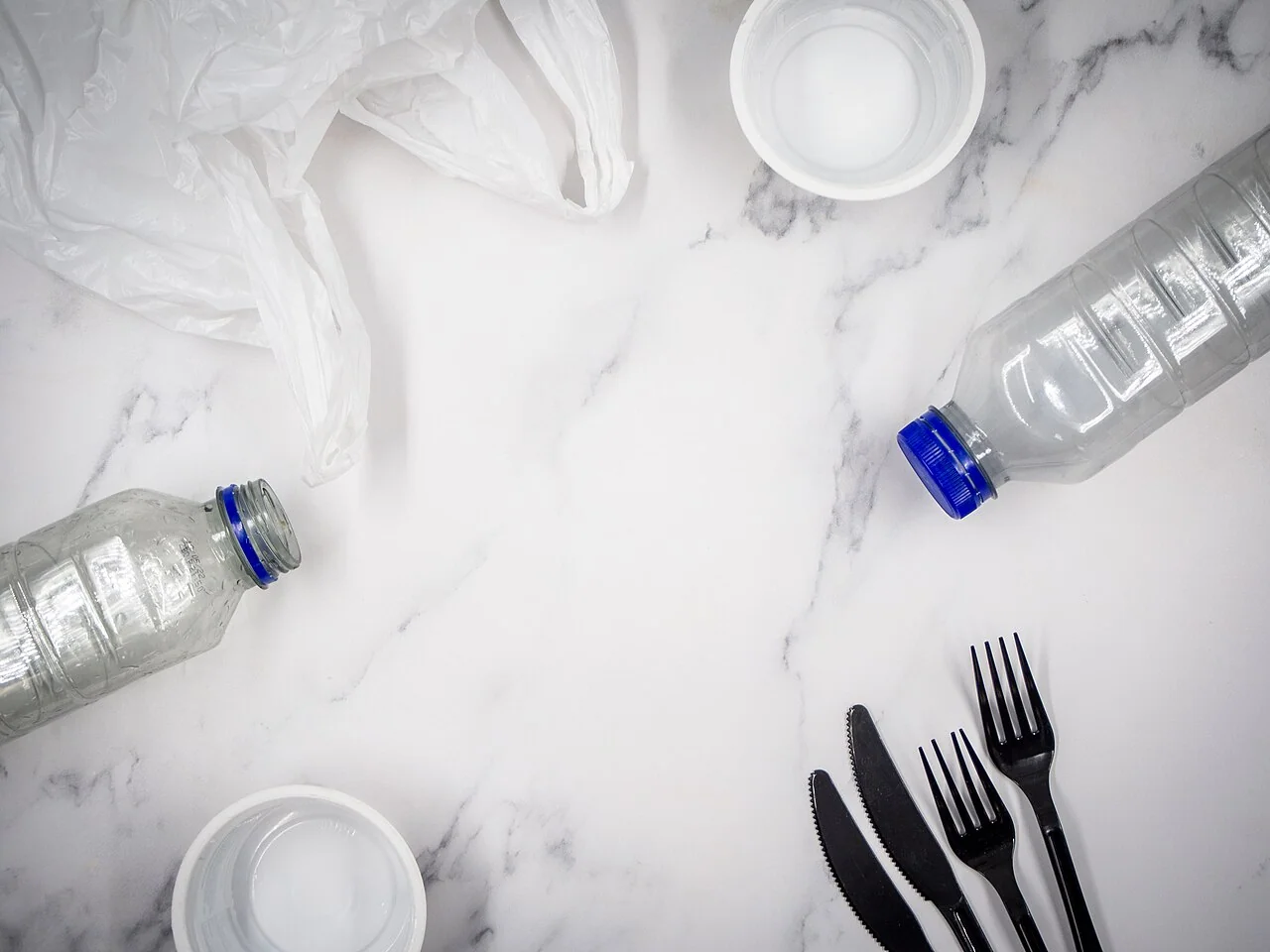 Assorted plastic food packaging piled together